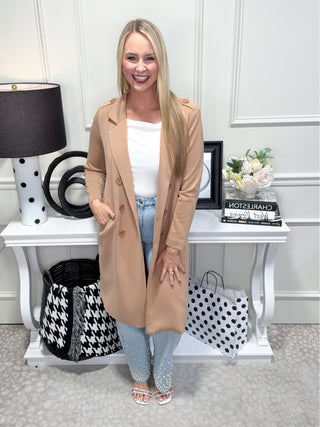 Chic camel coat, double-breasted, tailored fit, lightweight.
