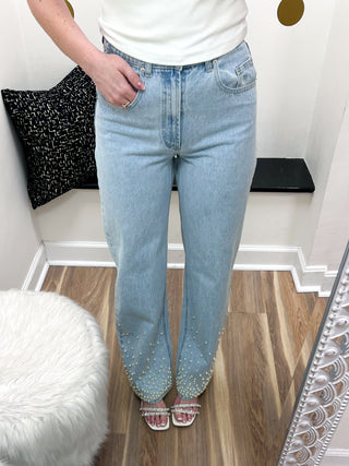 Light wash denim jeans with pearl details