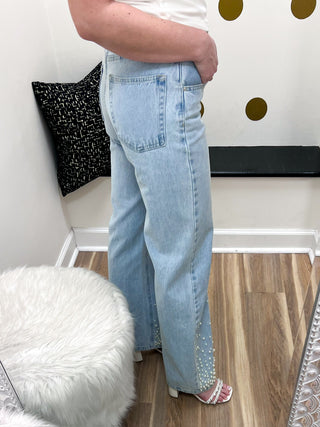 Light wash denim jeans with pearl details