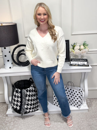 Cream knit sweater with floral embroidery