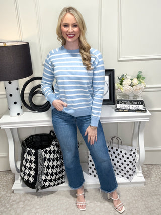 Blue and white striped knit sweater