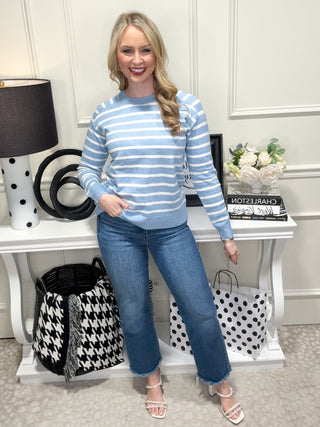 Blue and white striped knit sweater