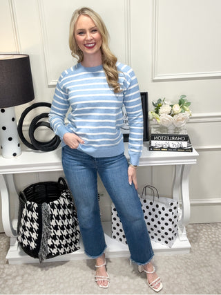 Blue and white striped knit sweater