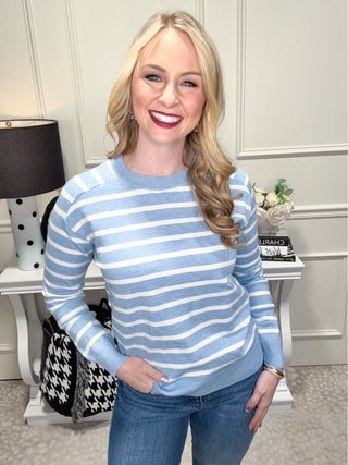 Blue and white striped knit sweater