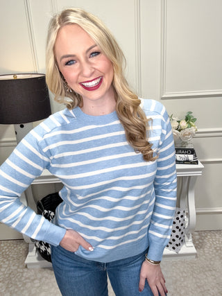 Blue and white striped knit sweater