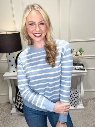 Blue and white striped knit sweater