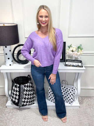 Purple sweater with sparkly rhinestone details