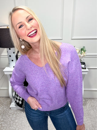 Purple sweater with sparkly rhinestone details